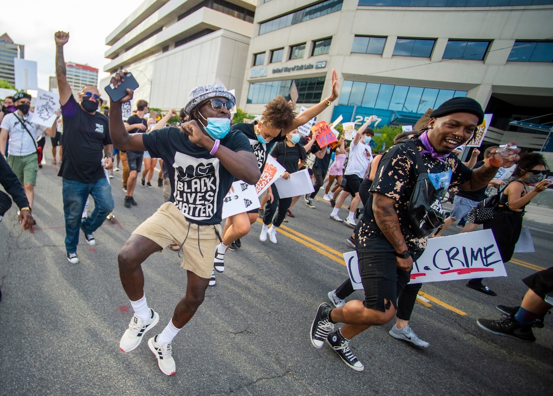 (Rick Egan  |  The Salt Lake Tribune)     Protesters dance in the streets of Salt Lake City, Saturday afternoon during a march for racial justice, on Saturday, June 20, 2020.