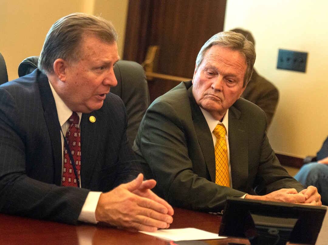 (Rick Egan  |  The Salt Lake Tribune)   Sen. Curt Bramble and Sen. Jerry Stephenson meet with Rep. Timothy Hawks to work out details on the alcohol bill, Thursday, March 14, 2019. 