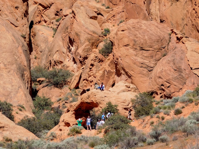 Erin Alberty  |  The Salt Lake TribuneHikers climb on Babylon Arch on April 1, 2017 in the Red Cliffs Desert Reserve near Leeds.