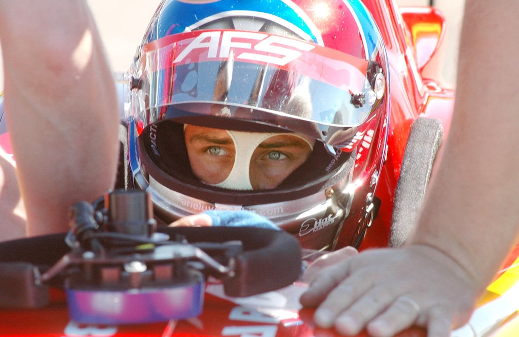(Paul Kizzle | The Associated Press) Arie Luyendyk, Jr., of Scottsdale, Ariz., sits in his car before the start of the IRL Menards Infinity Pro Series race in St. Petersburg, Fla., Sunday, April 3, 2005.