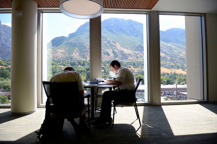 Al Hartmann  |  The Salt Lake TribuneMissionaries study with a view of the mountiains at the new building at the Missionary Training Center in Provo Wednesday July 26.  The new building which opened in June provides numerous places inside and out for contemplation and study. 