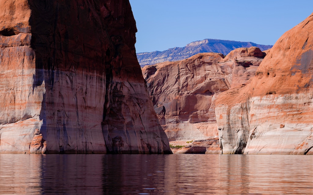 (Bethany Baker  |  The Salt Lake Tribune) The bathtub ring is visible at Lake Powell near Ticaboo, Utah on Tuesday, Oct. 17, 2023.