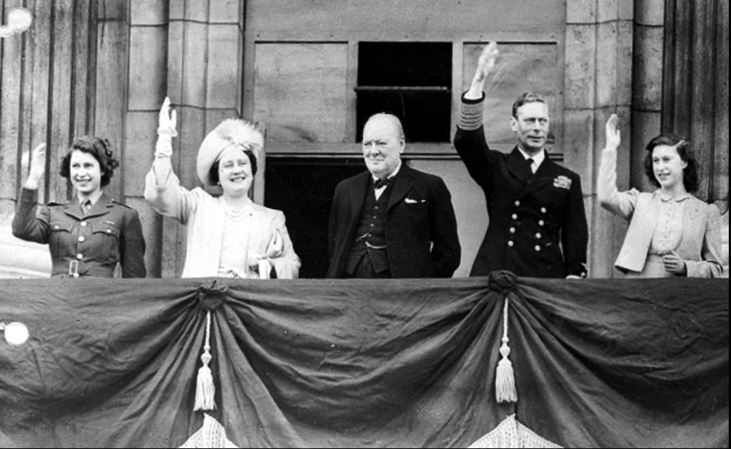 (AP file photo)  In this May 8, 1945, photo Britain's Prime Minister Winston Churchill, center, joins the royal family, from left, Princess Elizabeth, Queen Elizabeth, King George VI, and Princess Margaret, on the balcony of Buckingham Palace, London, England, on VE Day.