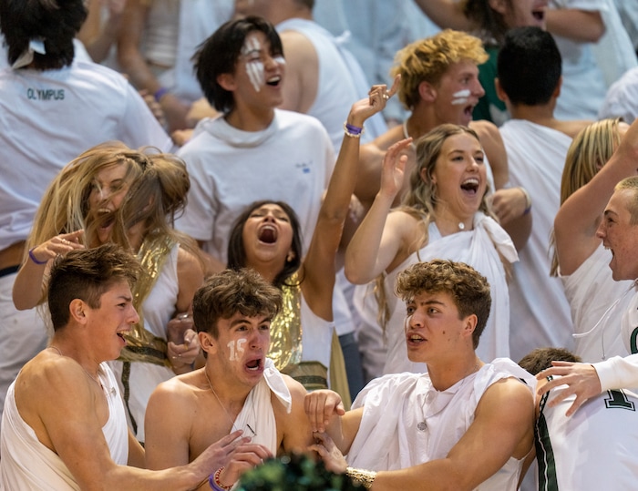 (Rick Egan | The Salt Lake Tribune) 
Olympus fans celebrate their State Championship win in the 5A State Championship game between Woods Cross and Olympus, at the Marriott Center in Provo, on Saturday, March 5, 2022. 