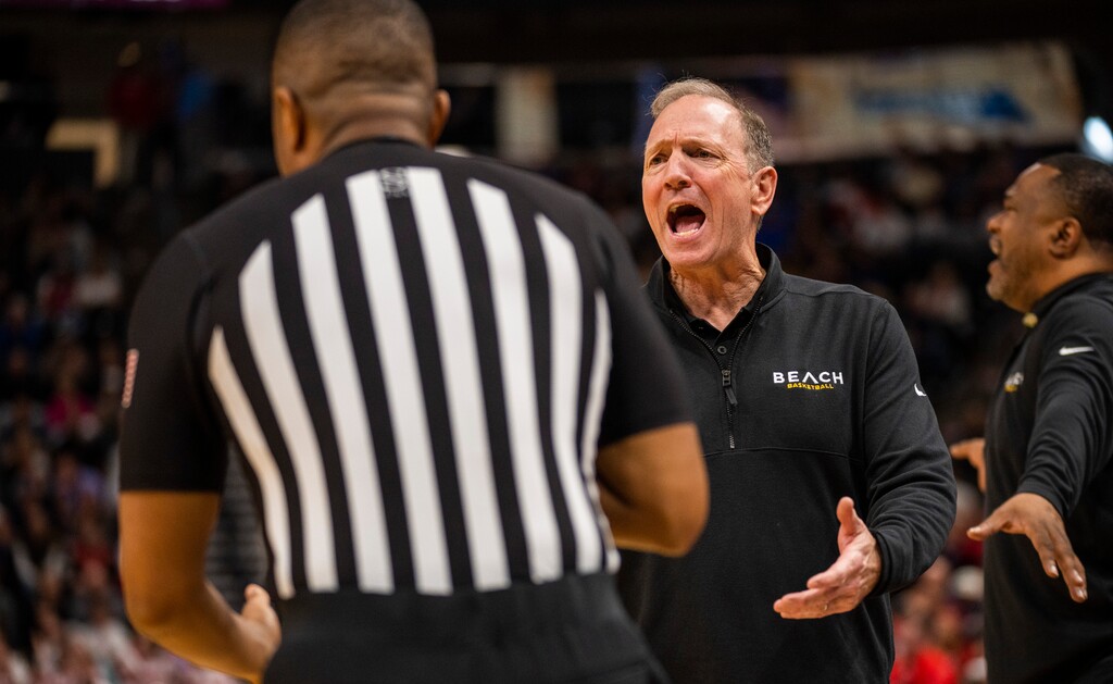 (Rick Egan | The Salt Lake Tribune) 
Long Beach State head coach Dan Monson talks to the official, in the First Round of the men's basketball NCAA Tournament at the Delta Center, on Wednesday, March 20, 2024.