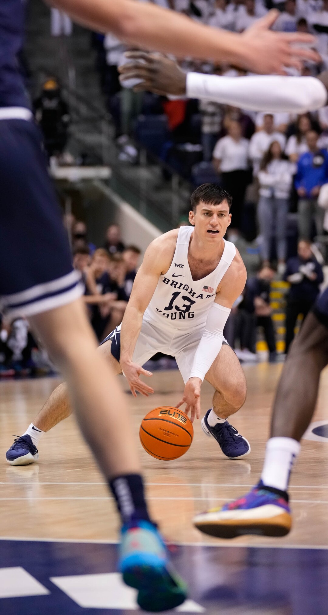 (Francisco Kjolseth | The Salt Lake Tribune) Brigham Young Cougars guard Alex Barcello (13) looks for an open teammate in basketball action between the Brigham Young Cougars and the Utah State Aggies at the Marriott Center in Provo, Wednesday, Dec. 8, 2021.