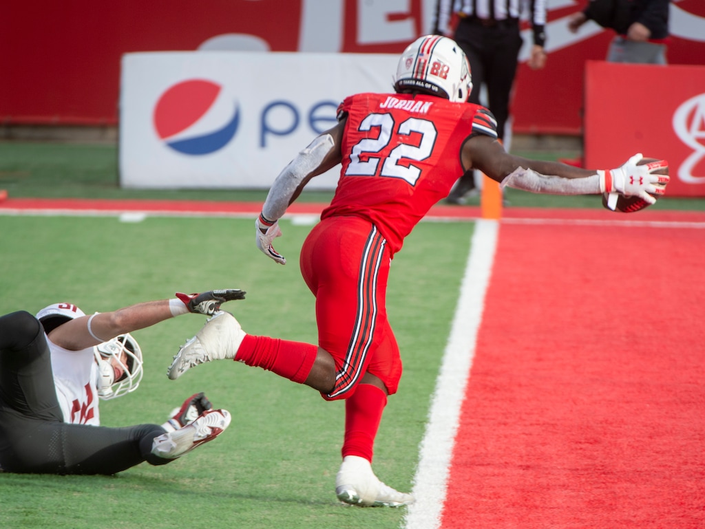 (Rick Egan | The Salt Lake Tribune) Utah Utes running back Ty Jordan (22) runs for a touchdown, in PAC-12 football acton between Utah Utes and Washington State Cougars at Rice-Eccles Stadium on Saturday, Dec. 19, 2020.