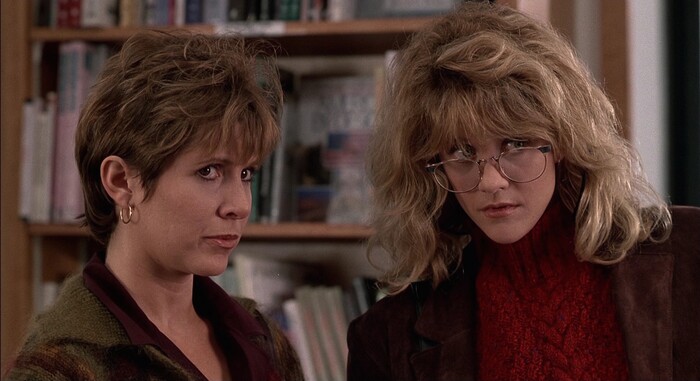 (courtesy photo) Carrie Fisher (left) plays Marie, best friend to Sally (Meg Ryan, right), in the 1989 romantic comedy "When Harry Met Sally…"