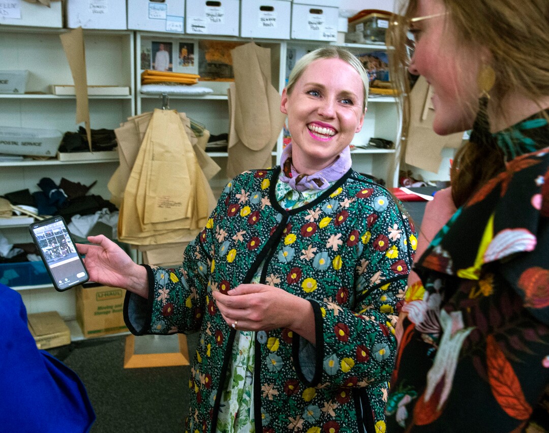 (Rick Egan  |  The Salt Lake Tribune)  Social media influencer Brittany Jepsen shares a photo with Hannah Lewis in the Utah Opera costume shop during a preview event for "Norma," at the Utah Opera Production Studios, Monday, April 15, 2019.