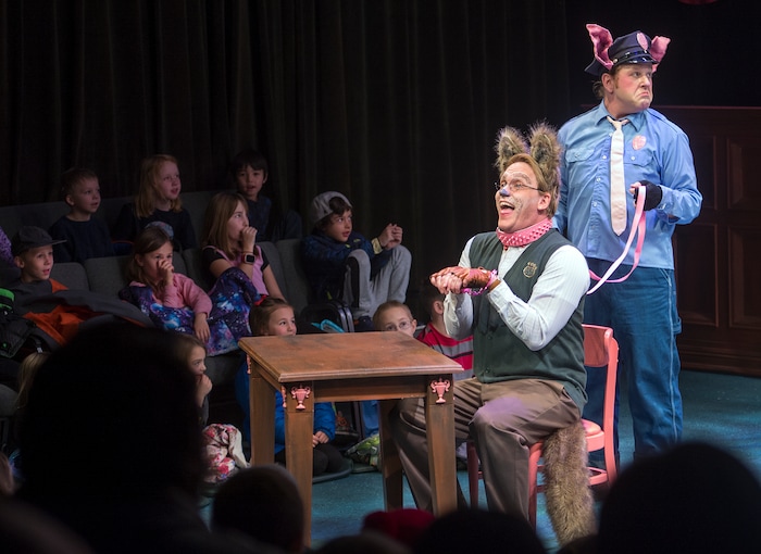 (Leah Hogsten | The Salt Lake Tribune) l-r Alexander T. Wolf, played by Derek Gregerson, is brought to court by Rocky, played by Trevor B. Dean ,during Salt Lake Acting Company's annual children's show, "The True Story of the 3 Little Pigs," running through Dec. 29.