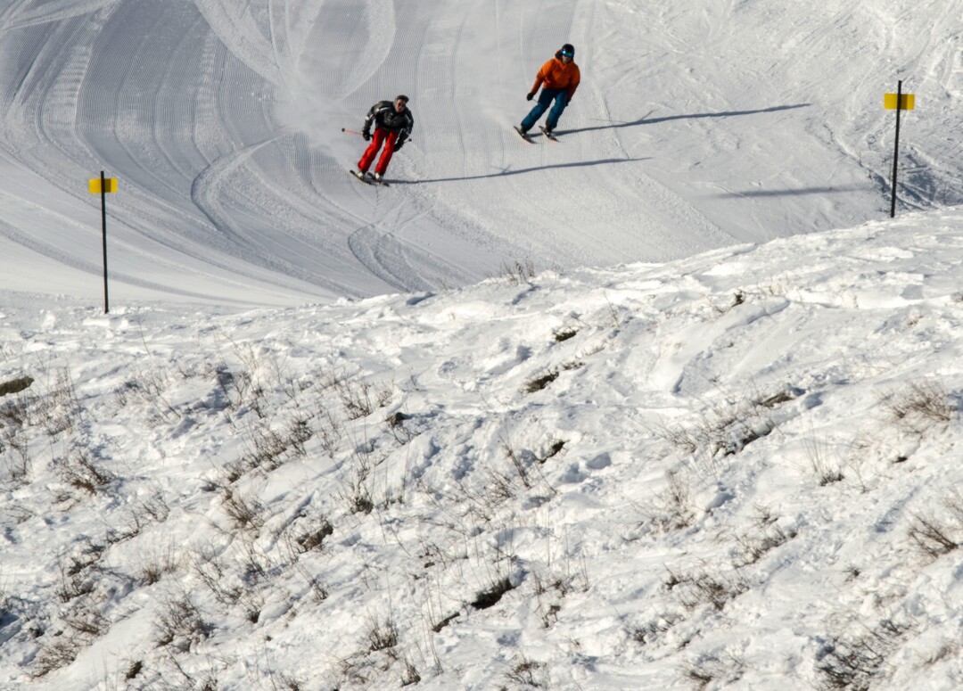 (Steve Griffin  |  The Salt Lake Tribune) Skiers zip down a groomed run at Brighton ski area in Salt Lake City Monday January 1, 2018.