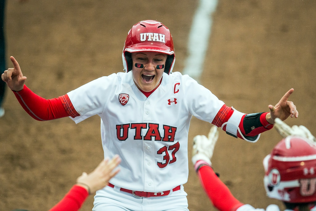 Chris Detrick | The Salt Lake Tribune
Utah infielder Heather Bowen (37) celebrates hitting a two-run homerun during the NCAA softball regional game at Dumke Family Softball Stadium Thursday, May 18, 2017.