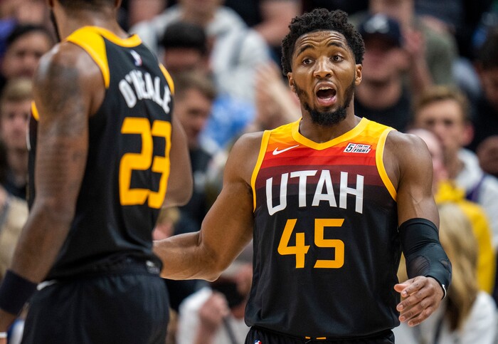(Rick Egan | The Salt Lake Tribune) Utah Jazz guard Donovan Mitchell (45) shouts some instructions to Utah Jazz forward Royce O'Neale (23), in NBA action between the Utah Jazz and the Washington Wizards, at Vivint Arena on Saturday, Dec. 18, 2021.