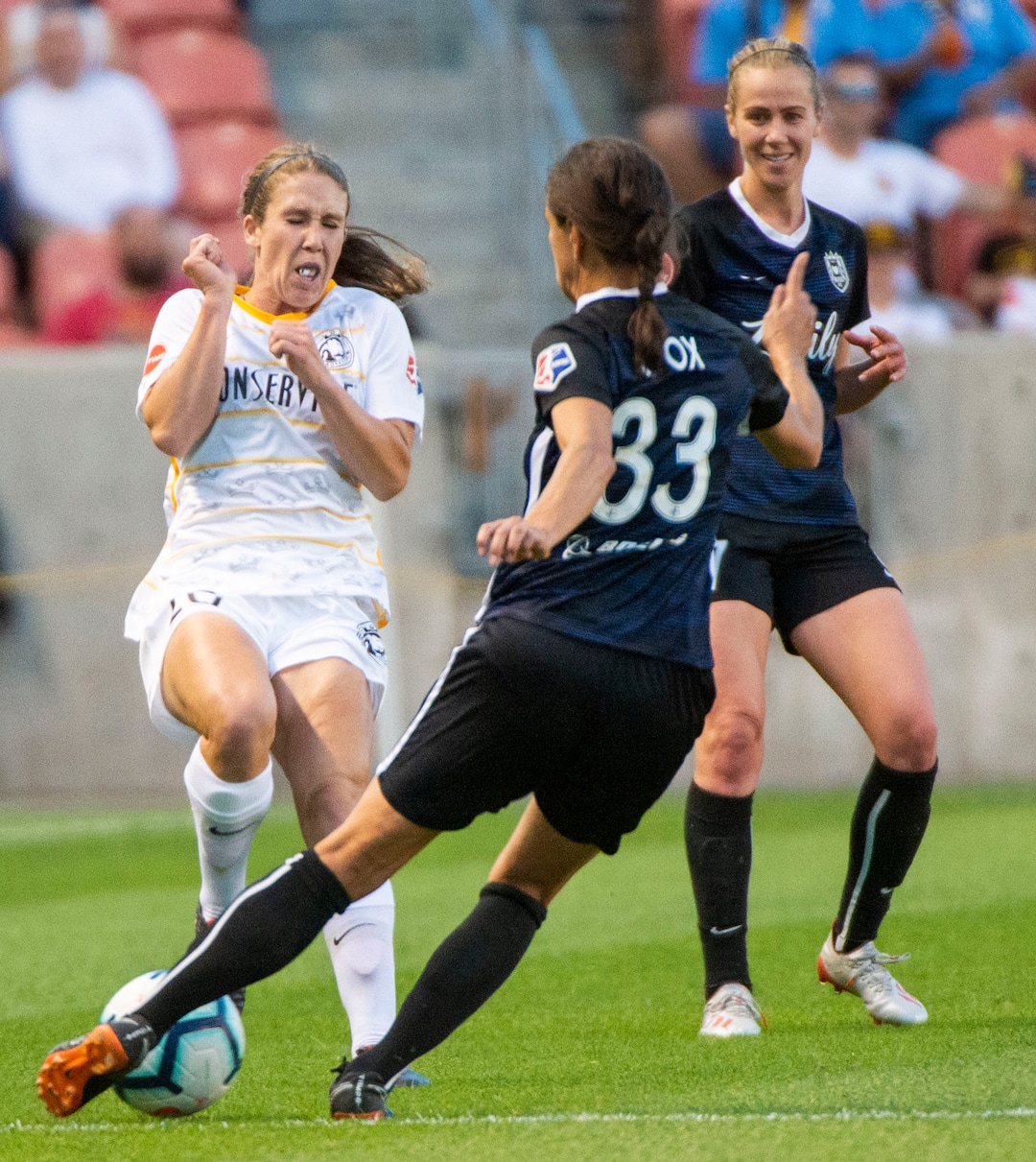 (Rick Egan  |  The Salt Lake Tribune)   \ss33\ goes for the ball, as Utah Royals FC forward Mallory Weber (20)defends, in soccer action between Utah Royals FC and Seattle Reign FC in Sandy, Friday, June 28, 2019.