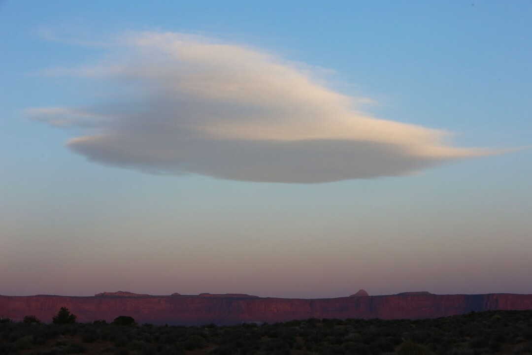 (Francisco Kjolseth | The Salt Lake Tribune) A lenticular cloud formation appears at sunrise from Murphy's Campground on the White Rim Trail in Canyonlands National Park in May, 2013.