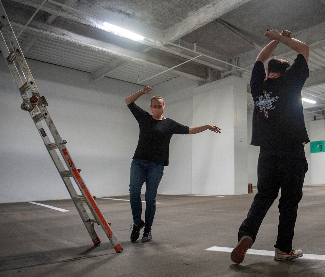 (Rick Egan | The Salt Lake Tribune) Kathryn Mortimer and Richard Curtis of Salt Lake City theater troupe SONDERimmersive rehearse  "Through Yonder Window," a theater-and-movement adaptation of "Romeo and Juliet." The performers stay at least 6 feet apart and audience members will stay in their cars.