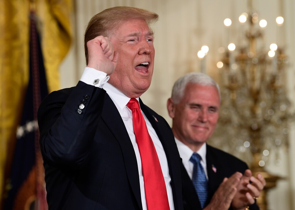 President Donald Trump speaks at the beginning of a National Space Council meeting in the East Room of the White House in Washington, Monday, June 18, 2018, as Vice President Mike Pence looks on. (AP Photo/Susan Walsh)