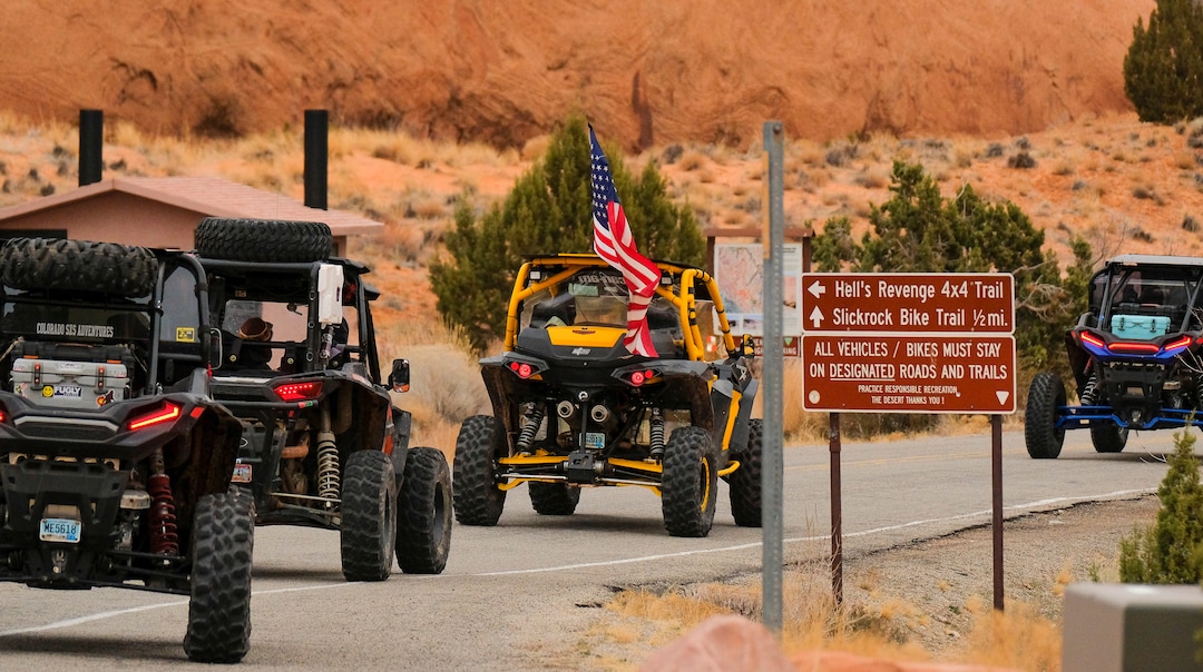 (Leah Hogsten | The Salt Lake Tribune) Several off-road utility terrain vehicles (UTVs) motor towards the Fins & Things 4x4 Trail at the Sand Flats Recreation Area trail, located just 4 miles from downtown Moab, Feb. 19, 2021.
