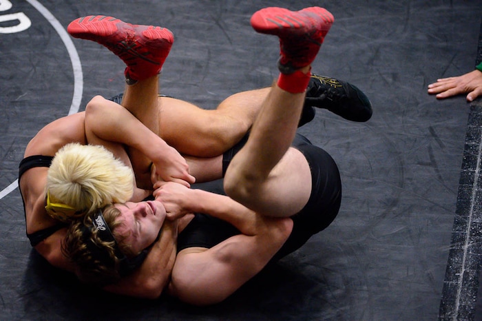 (Trent Nelson | The Salt Lake Tribune)  Wasatch's Zak Kohler pins Alta's Garrick Kilpack, 5A State Championships, high school wrestling quarterfinals in Orem, Wednesday February 7, 2018.