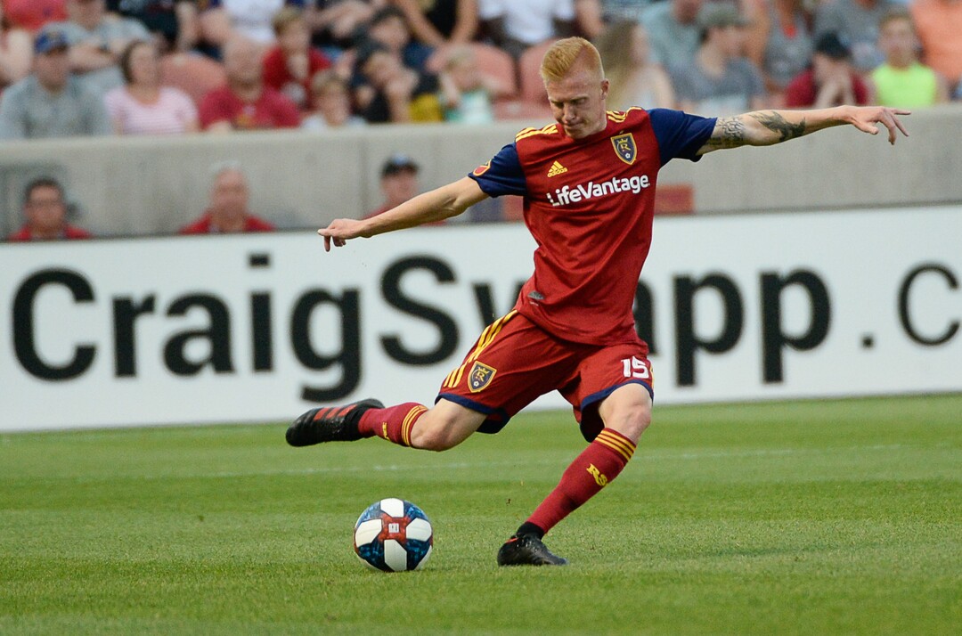 (Francisco Kjolseth  |  The Salt Lake Tribune)  Real Salt Lake defender Justen Glad (15) sends the ball downfield as Real Salt Lake hosts Columbus Crew SC, in MLS Soccer at Rio Tinto Stadium in Sandy, Utah on Wed, July 3, 2019.