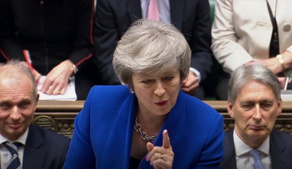 Britain's Prime Minister Theresa May speaks during Prime Minister's Questions in the House of Commons, London, Wednesday Jan. 16, 2019.  In a historic defeat for the government Tuesday, Britain's Parliament discarded May's Brexit deal to split from the European Union, and May now faces a parliamentary vote of no-confidence later Wednesday. (House of Commons/PA via AP)