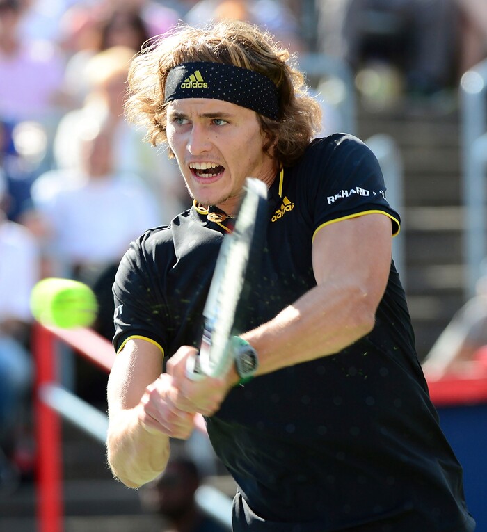 Alexander Zverev, of Germany, hits a backhand to Roger Federer, of Switzerland, during the final of the Rogers Cup tennis tournament Sunday, Aug. 13, 201, in Montreal. (Paul Chiasson/The Canadian Press via AP)