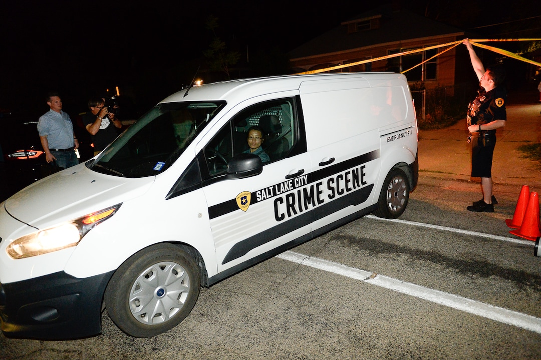 (Francisco Kjolseth  |  The Salt Lake Tribune)  Police investigators search a home at 547 N. 1000 West in Salt Lake City as part of the disappearance of University of Utah student MacKenzie Lueck on Wed. June 26, 2019.