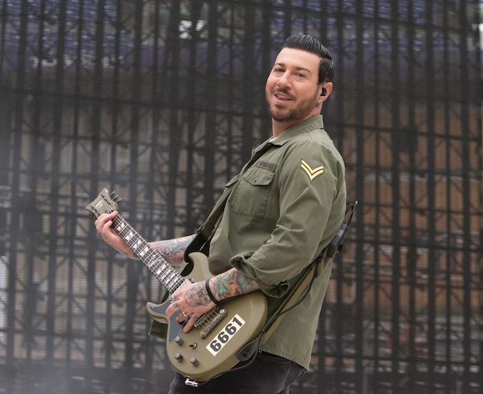 (Photo by Owen Sweeney/Invision/AP) Guitarist Zacky Vengeance of Avenged Sevenfold (shown performing at M&T Bank Stadium on Wednesday, May 10, 2017, in Baltimore), said the band's challenge is to figure out, "How do you create something that will last and stick with somebody for a lifetime? Something that’s beautiful, something that’s artistic?"