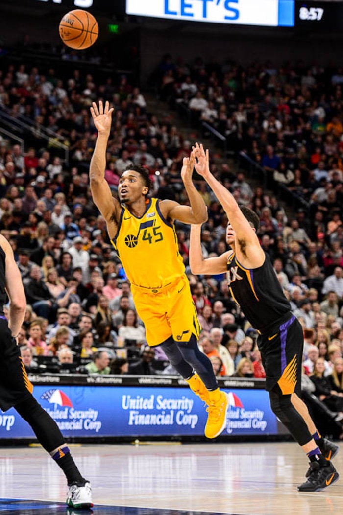(Trent Nelson | The Salt Lake Tribune)  Utah Jazz guard Donovan Mitchell (45) shoots as the Utah Jazz host the Phoenix Suns, NBA basketball in Salt Lake City, Wednesday Feb. 14, 2018.