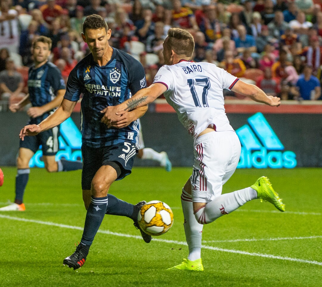 (Rick Egan  |  The Salt Lake Tribune)       Real Salt Lake forward Corey Baird (17) collides with Los Angeles Galaxy defender Daniel Steres (5), in MLS soccer action between Real Salt Lake and Los Angeles Galaxy at Rio Tinto Stadium, Wednesday, Sept. 25, 2019.