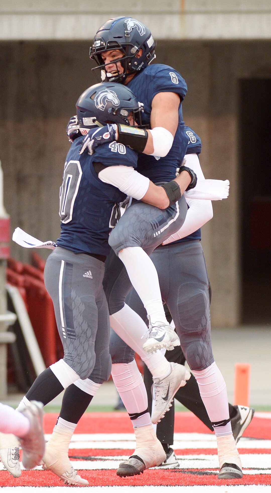 (Leah Hogsten  |  The Salt Lake Tribune) Corner CanyonÕs quarterback Cole Hagen celebrates Dylan SimonsÕ touchdown. Corner Canyon High School takes on American Fork High School during the 6A State Championship football title, Nov. 22, 2019 at Rice-Eccles Stadium.