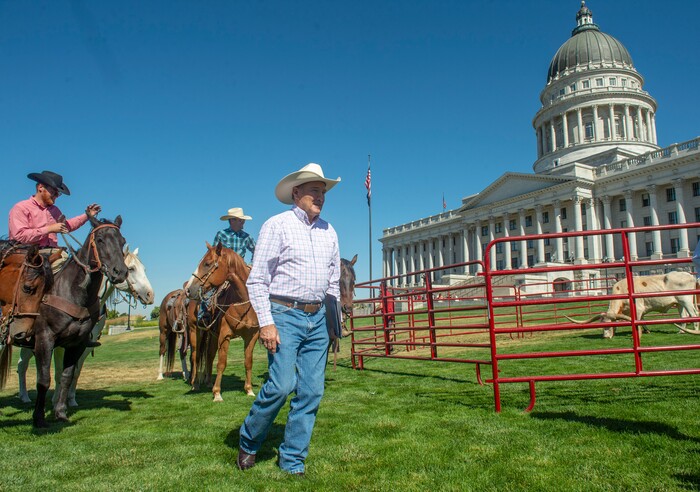 (Rick Egan  |  The Salt Lake Tribune)       Gov. Herbert makes his way to a news conference about the Days of 47 festivities, on the State Capitol lawn with long horn cattle in the background, Tuesday, July 16, 2019.