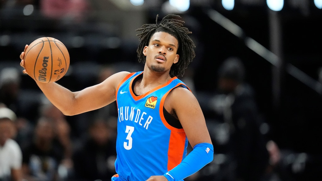 Oklahoma City Thunder's Dillon Jones (3) brings the ball up court during the first half of an NBA summer league basketball game against the Philadelphia 76ers Monday, July 8, 2024, in Salt Lake City. (AP Photo/Rick Bowmer)