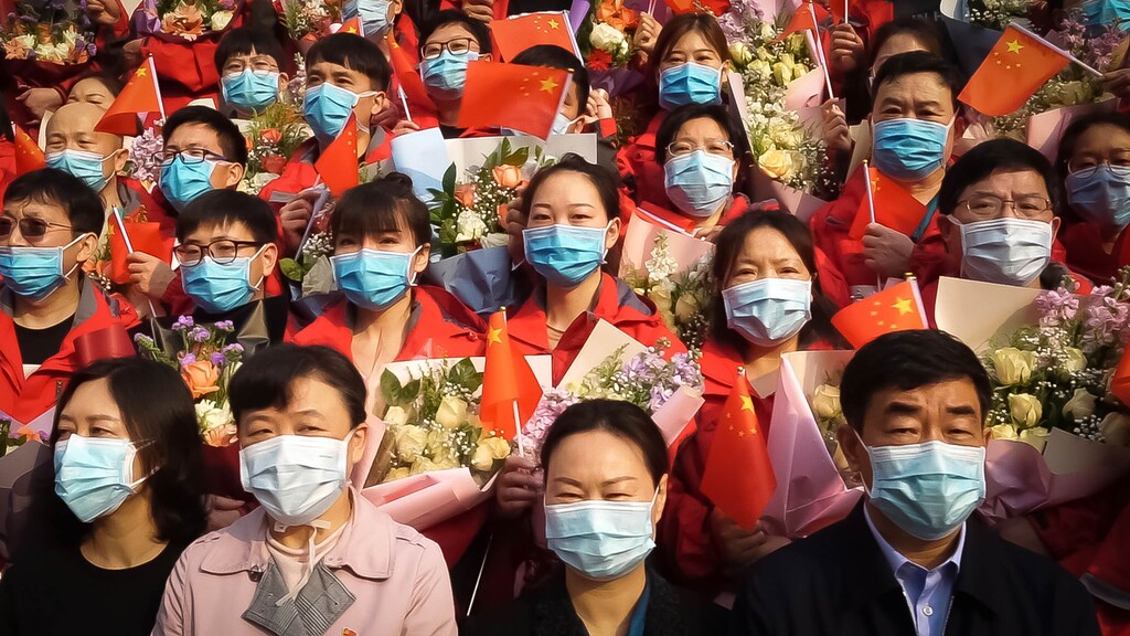 (Photo courtesy of Sundance Institute) People in China mask up in response to the COVID-19 pandemic, chronicled in Nanfu Wang's documentary "In The Same Breath." It's an official selection of the Premieres section at the 2021 Sundance Film Festival.