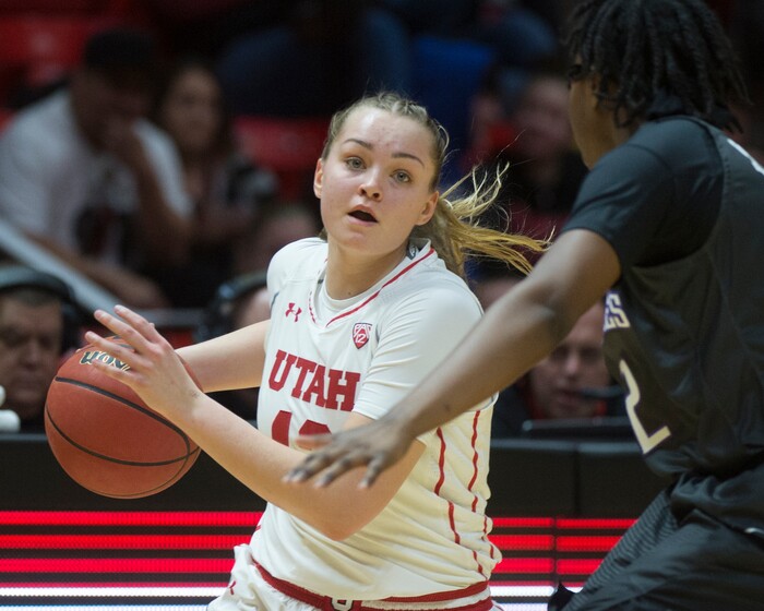 (Rick Egan  |  The Salt Lake Tribune)       Utah Utes forward Megan Jacobs (13) brings the ball down court, in PAC-12 women's basketball action at the Jon M. Huntsman Center, Sunday, Feb. 18, 2018.