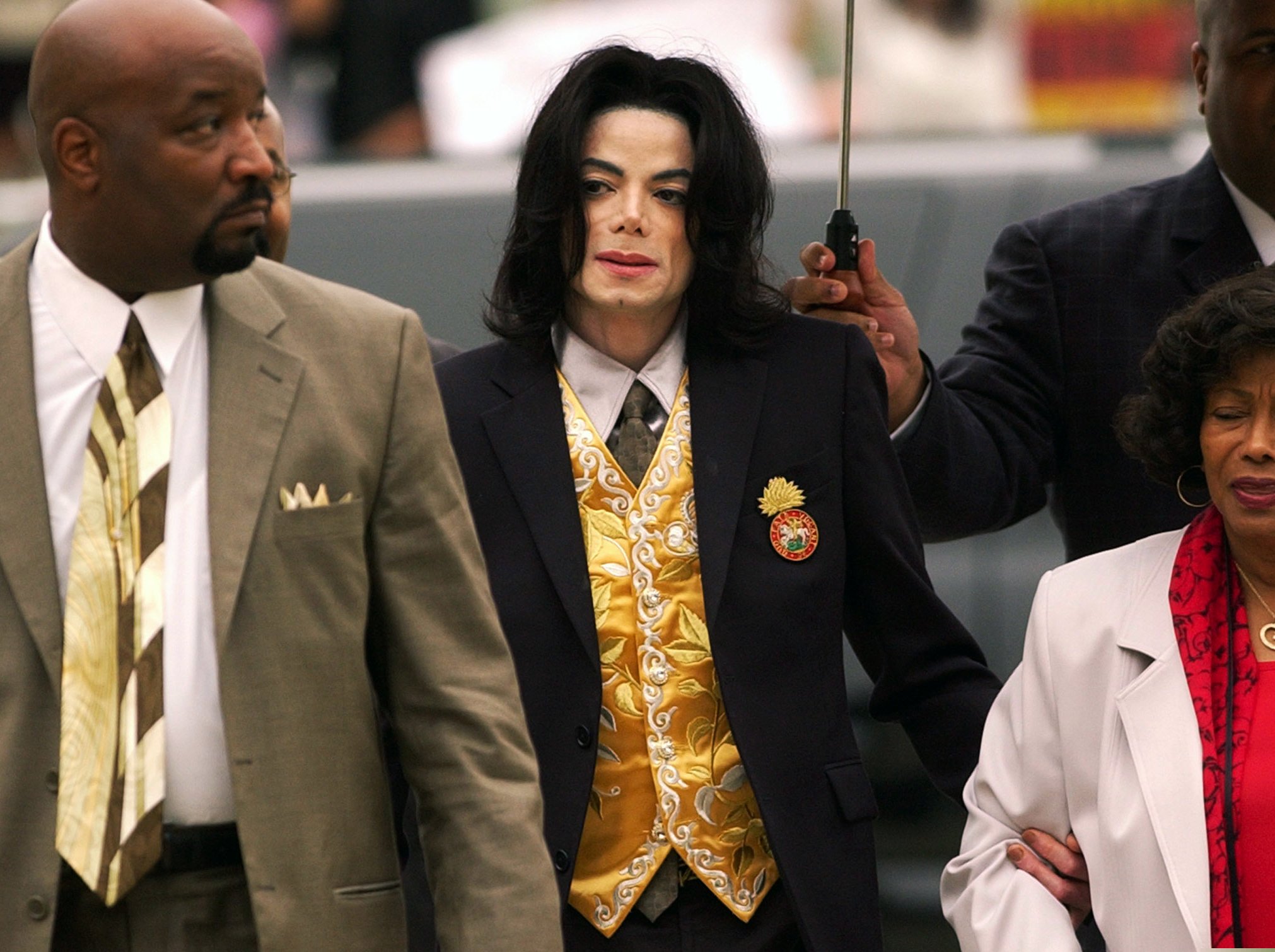 FILE - In this May 25, 2005, file photo, Michael Jackson arrives at the Santa Barbara County Courthouse for his child molestation trial in Santa Maria, Calif. A documentary film about two boys who accused Michael Jackson of sexual abuse is set to premiere at the Sundance Film Festival later this month. The Sundance Institute announced the addition of “Leaving Neverland” and “The Brink,” a documentary about Steve Bannon, to its 2019 lineup on Wednesday. The Sundance Film Festival kicks off on Jan 24 and runs through Feb. 4. (Aaron Lambert/Santa Maria Times via AP, Pool)