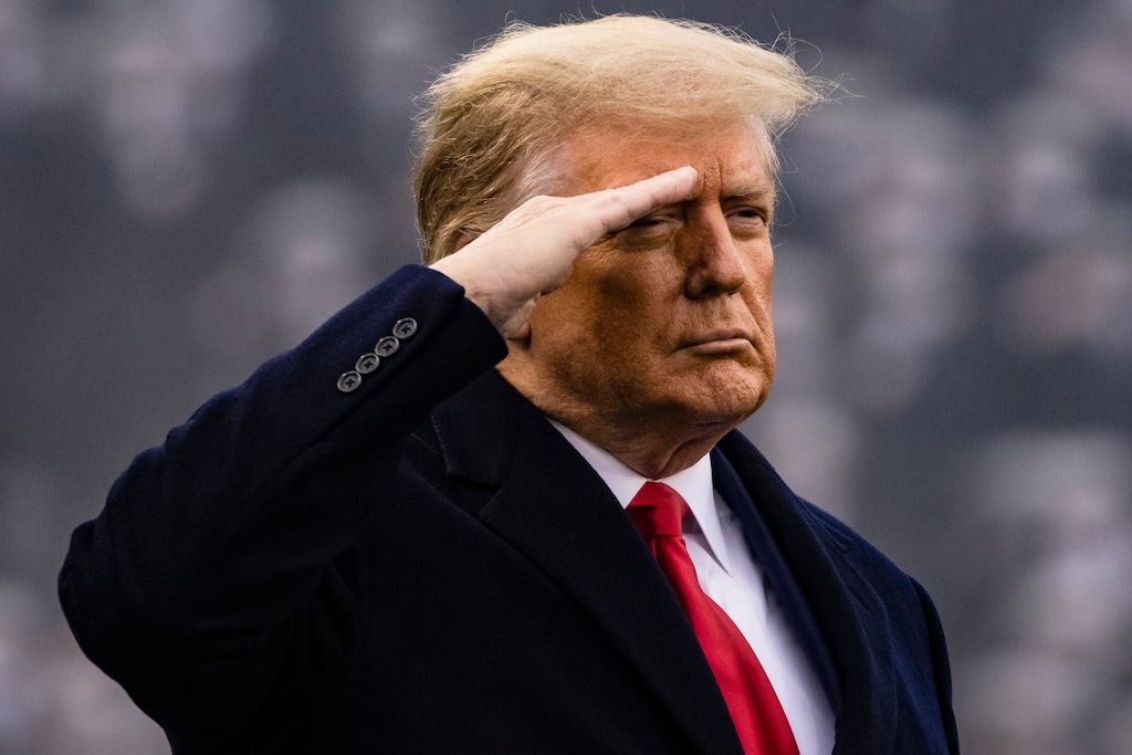 (Samuel Corum | The New York Times)
President Donald Trump salutes during the Army-Navy football game at the U.S. Military Academy in West Point, N.Y., Dec. 12, 2020. "Trump is attempting to drag Jim Crow into the Twitter era," writes The New York Times columnist Charles M. Blow.