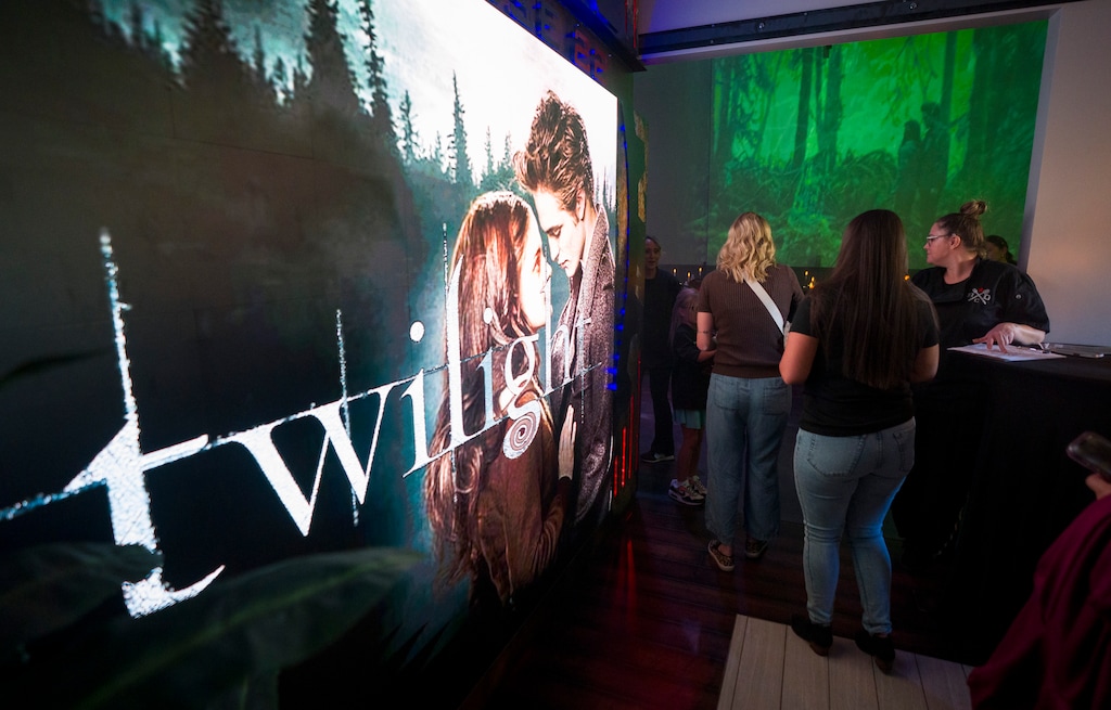 (Bethany Baker  |  The Salt Lake Tribune) Guests file in for the showing of Twilight for CineBites, an event where guests watch a movie and eat food inspired by the movie, at Warehouse 22 in Syracuse on Friday, June 12, 2026.