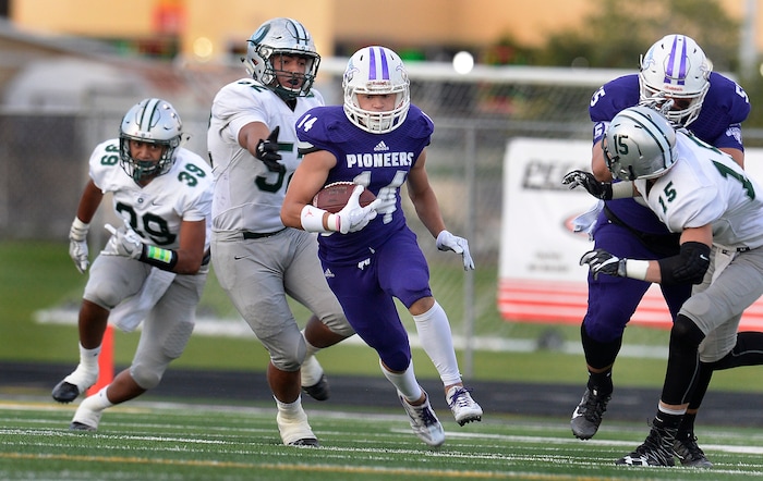 (Scott Sommerdorf   |  The Salt Lake Tribune)   Lehi's Jaxon Moody scampered for a long TD run on the game's first play from scrimmage, but it was called back by a penalty. Lehi kept rolling on offense however and led Olympus 26-0 late in the second half, Friday, September 22, 2017.