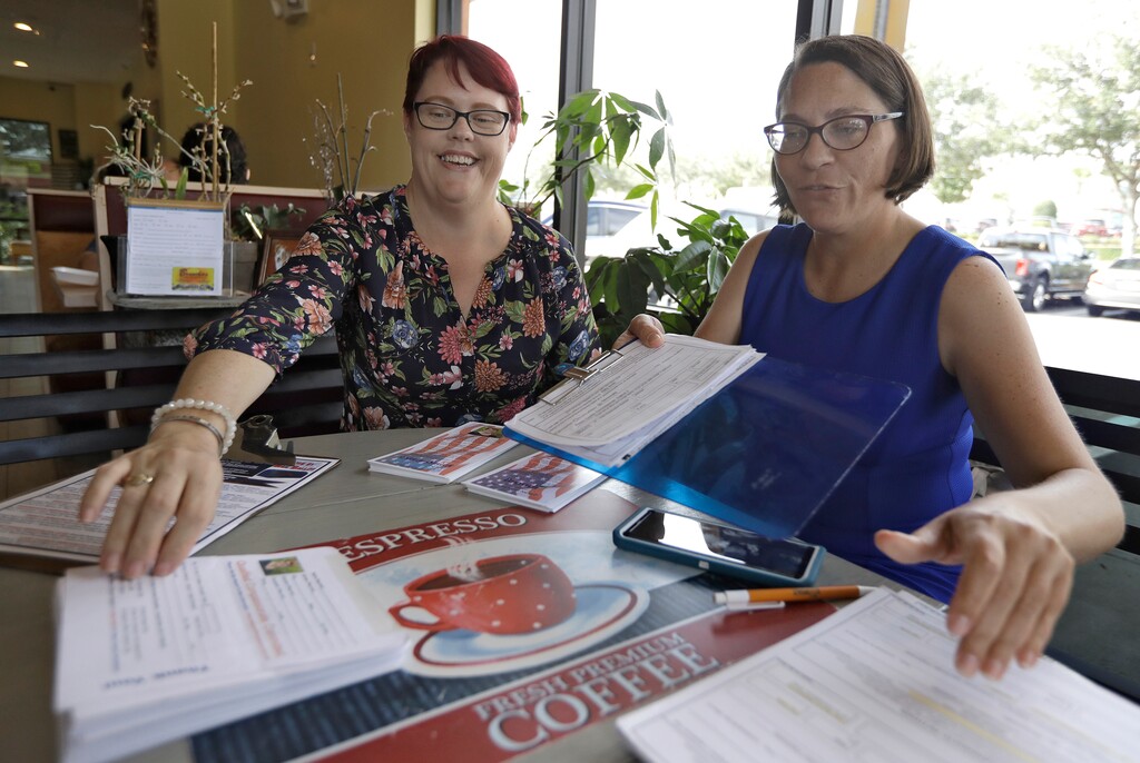 (Chris O'Meara | AP photo)

Pasco County Commission candidates Kelly Smith, left, and Brandi Geoit prepare forms for their Galentine's Day meeting Monday, Feb. 12, 2018, in Lutz, Fla. Galentine's Day, which is celebrated on Feb. 13, is a day to celebrate not only women's friendships, but activism. In the light of the #MeToo movement, Galentine's Day marks the positivity of the women's movement and female solidarity.
