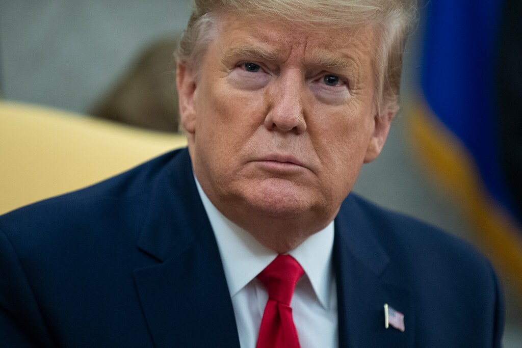 President Donald Trump listens to a question during a meeting with Guatemalan President Jimmy Morales in the Oval Office of the White House, Tuesday, Dec. 17, 2019, in Washington. (AP Photo/ Evan Vucci)