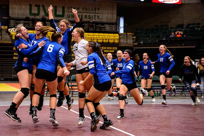 (Trent Nelson | The Salt Lake Tribune) Panguitch players celebrate victory, defeating Rich in the 1A State Volleyball Championship game in Orem, Saturday October 28, 2017.