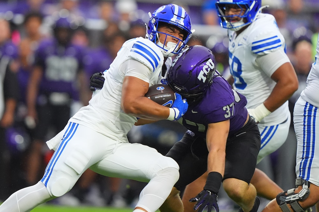 (LM Otero | AP Photo) BYU running back Lj Martin, left, runs into TCU linebacker Hudson Hooper (37) during the first half of an NCAA college football game Saturday, Oct. 3, 2026, in Fort Worth, Texas.