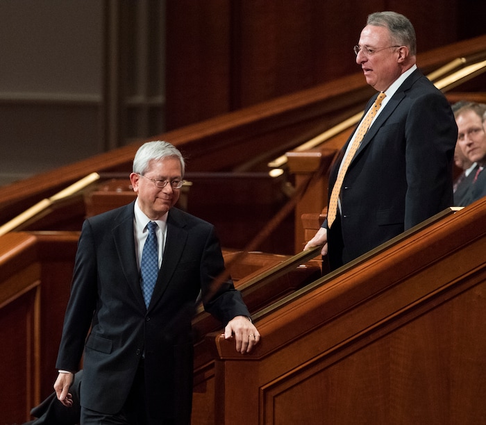 (Rick Egan  |  The Salt Lake Tribune)         Gerrit W. Gong and Ulisses Soares leave their seats to join the quorum of the 12 apostles, during the morning session of the 188th Annual General Conference in Salt Lake City, Saturday, March 31, 2018.