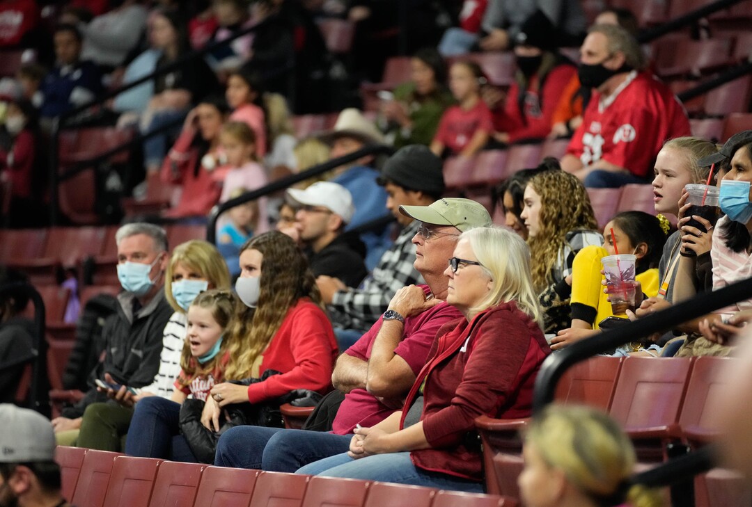 (Francisco Kjolseth | The Salt Lake Tribune) People take in the events at the Best of Utah NCAA Gymnastics Meet at the Maverik Center in West Valley City on Friday, Jan. 7, 2022.