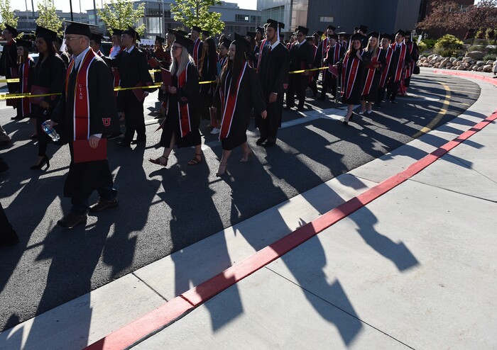 (Francisco Kjolseth  |  The Salt Lake Tribune)  University of Utah in Salt Lake City begins their celebration of its largest graduating class with 8,568 graduates for their 2018 commencement ceremonies on Thursday, May 3, 2018, on their way to the Jon M. Huntsman Center.
