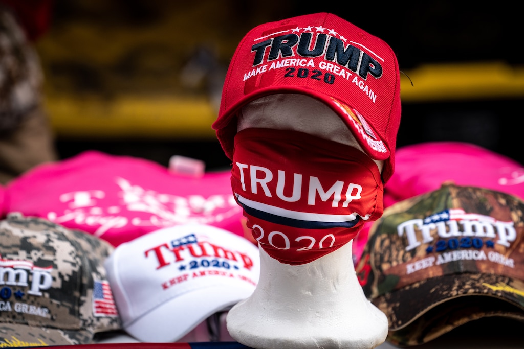 (Erin Schaff/The New York Times)
"TRUMP 2020" merchandise, including a face mask, on sale near the BOK Center in Tulsa, Okla., on June 20, 2020. It’s not just that the United States has the highest number of coronavirus cases and deaths of any country in the world. Republican political dysfunction has made a coherent campaign to fight the pandemic impossible, Michelle Goldberg writes.