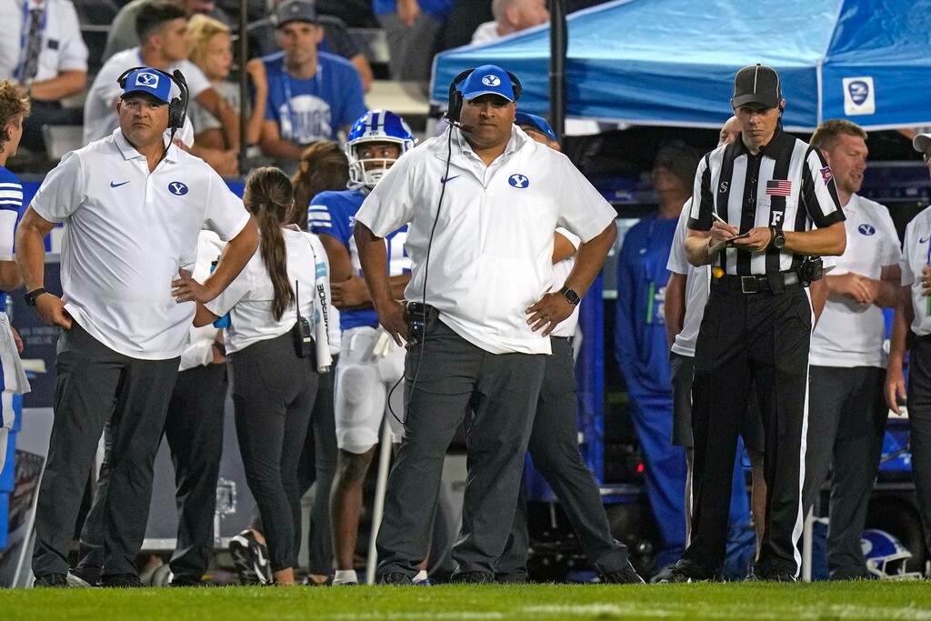 (Rick Bowmer | AP) BYU coach Kalani Sitake, center, watches during the first half of the team's NCAA college football game against Sam Houston State on Saturday, Sept. 2, 2023, in Provo, Utah.
