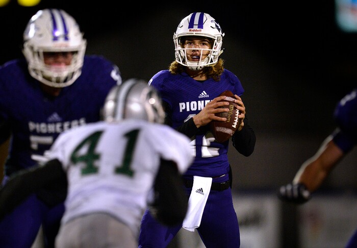 (Scott Sommerdorf | The Salt Lake Tribune)
Lehi QB Cammon Cooper loos to pass during first half play. Lehi led Olympus 26-0 late in the second half, Friday, September 22, 2017.