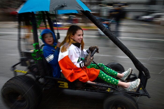 (Scott Sommerdorf | The Salt Lake Tribune) Lexi Flynn of the Flynn Clan speeds around during the 40th annual Salt Lake City St. Patrick's Day Parade on Saturday, March 17, 2018.